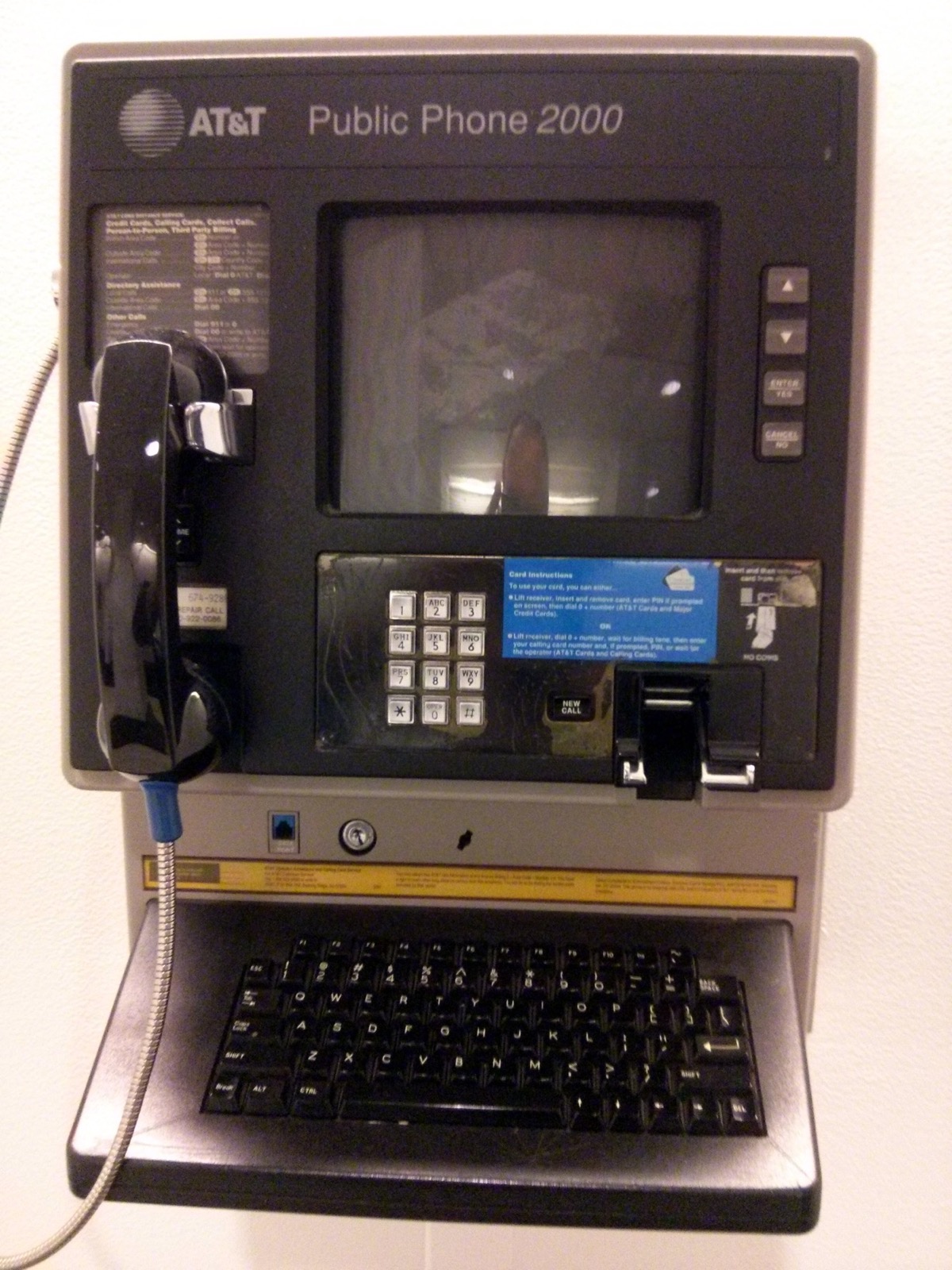 AT&T Public Phone 2000 payphone with display and keyboard shelf